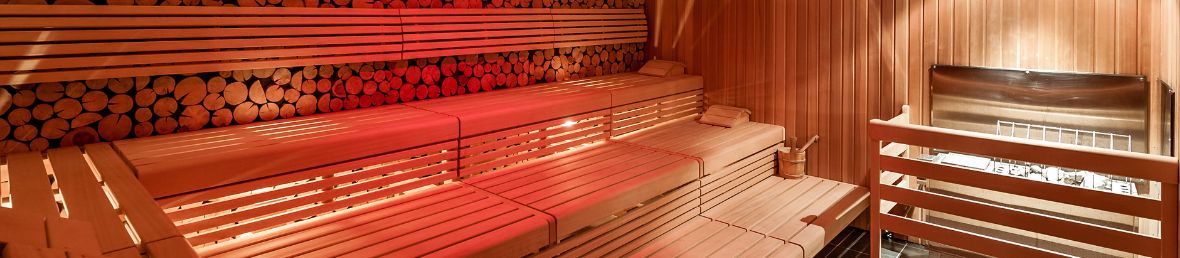 sauna hybride avec infrarouges et pierres chaudes pour la vapeur